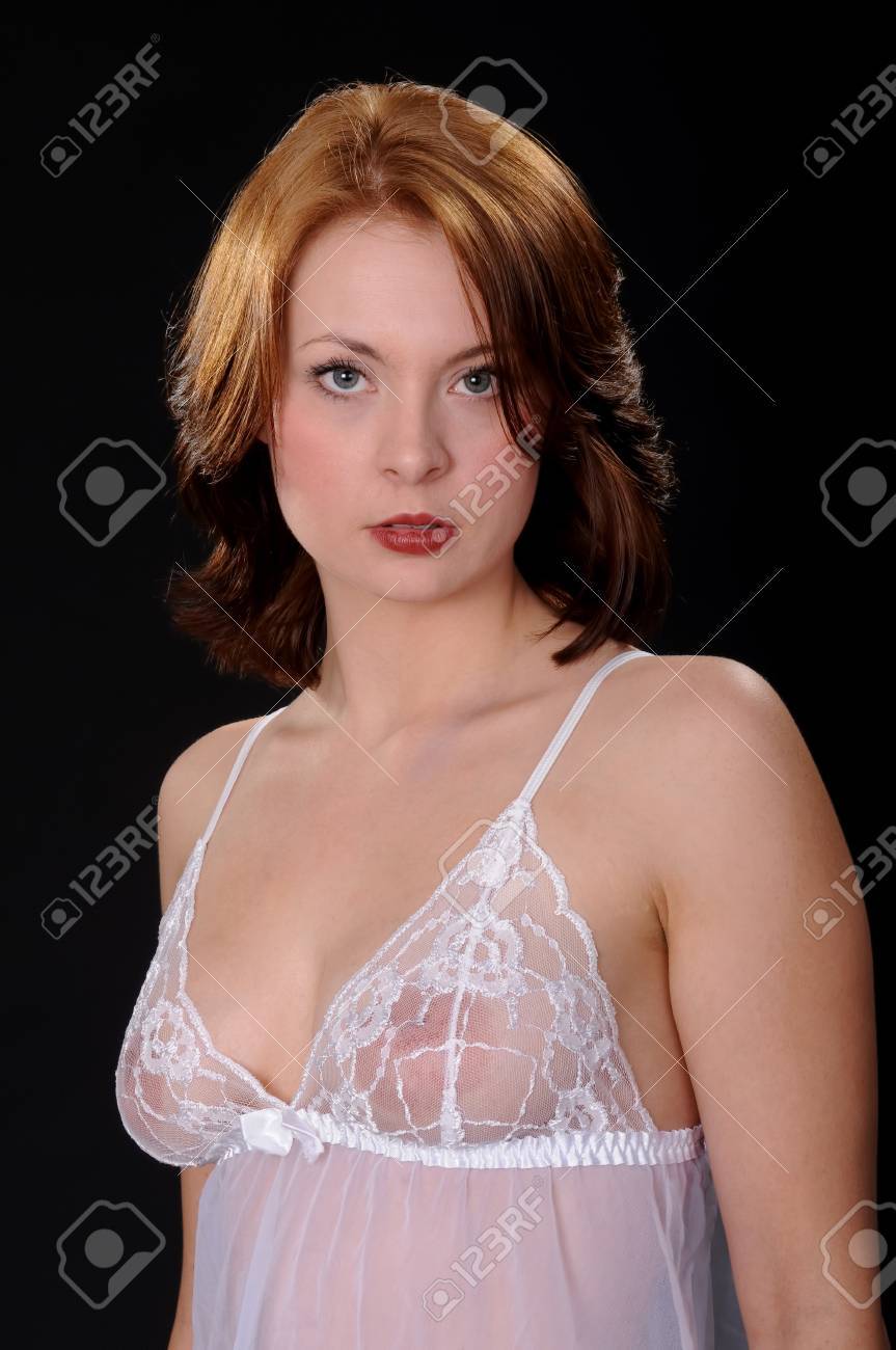 Beautiful Sexy Redhead Woman Isolated Over Black Stock Photo Picture and Royalty Free Image. Image 66117021.