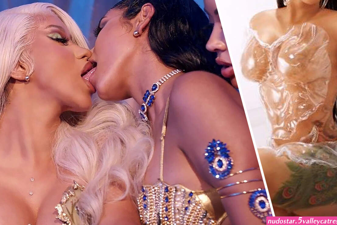 Cardi B snogs her female dancers and poses in see-through corset for sexy new video for Up