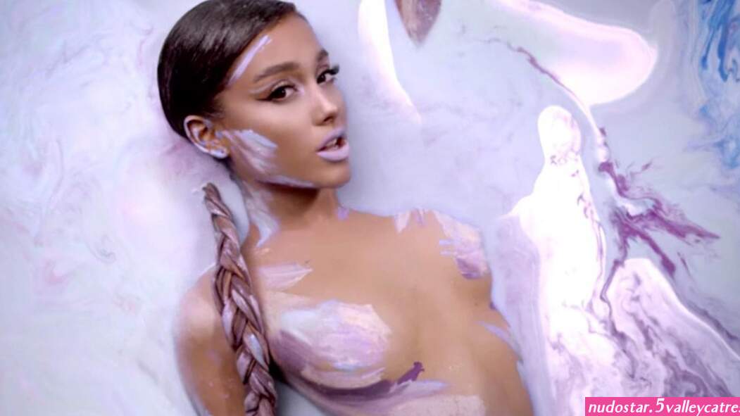 Ariana Grande Reposts Deleted Painted Topless Photo