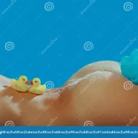Beautiful Buttocks Ass Bum Butt. Naked Body Lying in Bathroom with Soap Foam Indoo. Nude Woman in Elegant Pose Stock Image