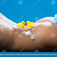 Ass. Naked Body Big Ass Beautiful Buttocks. Nude Girl. Intimate Hygiene Erotica Soap Foam Shower Gel Stock Photo