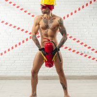 Naked Male Construction Worker Wearing A Construction Workers Helmet And Holding A Fire Extinguisher Stock Photo Picture and Royalty Free Image. Image 161596590.