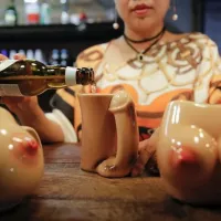 Beijing fetish restaurant teases with lobster and sex