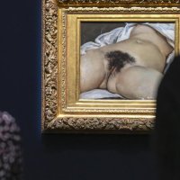 Frances famous Origin of the World painting sprayed with graffiti