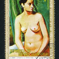 Female Nude in Front of Green Hanging Editorial Stock Image