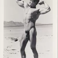 Male Nude Flexing on Beach