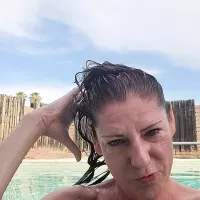 Naked Swimming and Smoking Mature Woman: American Amateur Porn