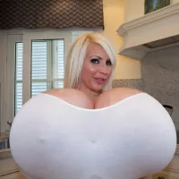 I have worlds largest fake boobs at size XXX cup