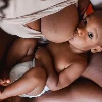 Breastfeeding with Big Boobs: Concerns Holds and Tips