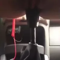Girl fucks cars gear shifter