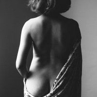 What does implied nude photography mean?
