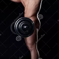 Smiling Muscular Nude Heavyweight Posing with Rod Stock Image