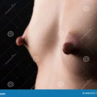 Small Breasts with Large Nipples Closeup Stock Photo