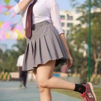 Sexy girl in school dress outfit with milky thighs