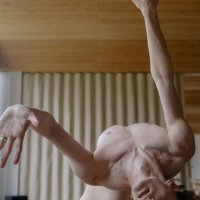 Naked Dancer Bending Backwards while Dancing in a Contemporary Style Free Stock Photo