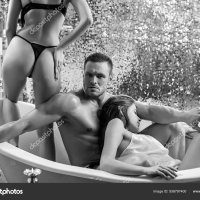 Sexy people in bathroom. Threesome concept. Three people having group sex together. One man and two